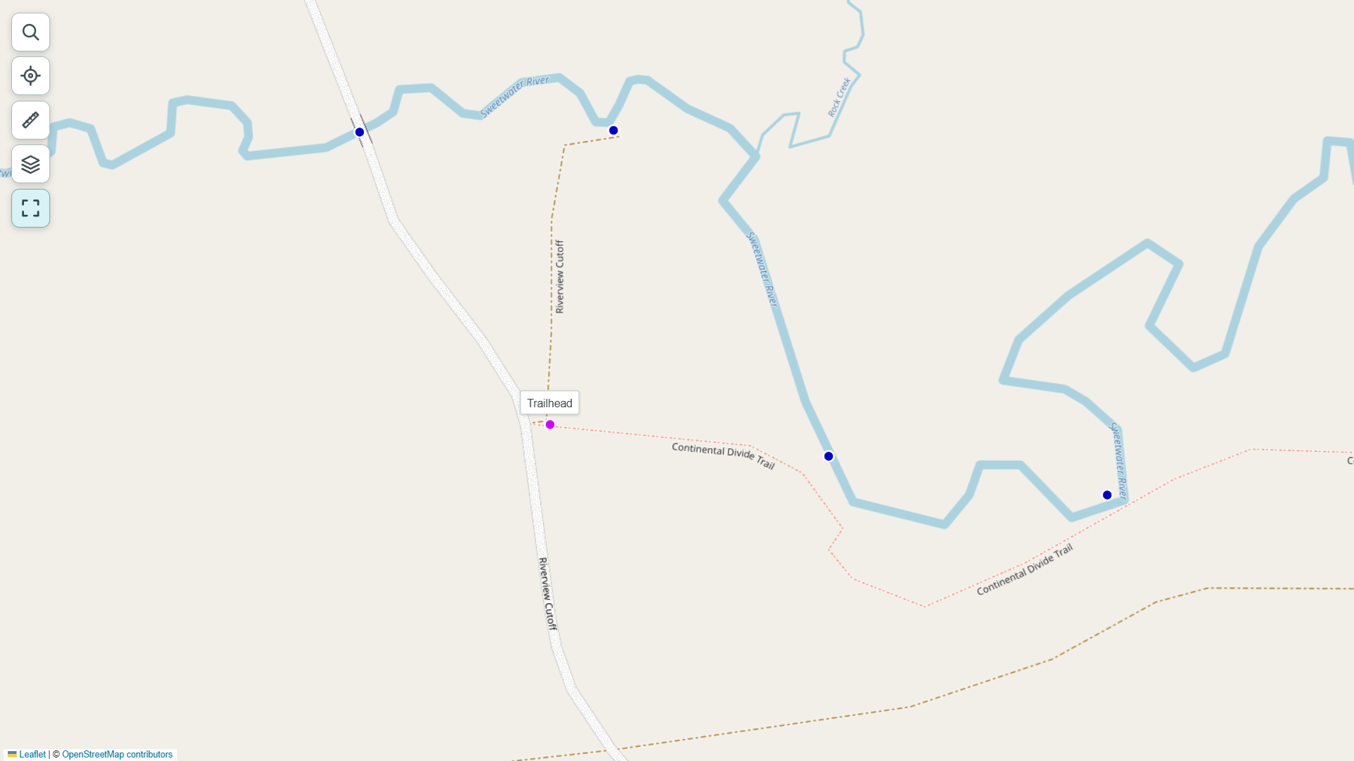 Trailhead example: magenta pin and dashed route toward Sweetwater River.